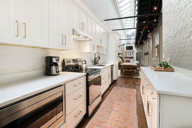Double Condo Rental with Luxurious Art-Filled Suites & Private Rooftop Terrace Near French Quarter and Superdome image 37