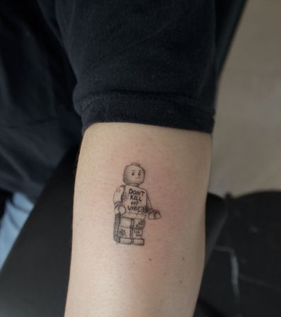 Get Inked in Style: Fine-Line Tattoo Session image 6