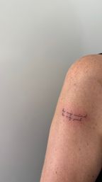 Get Inked in Style: Fine-Line Tattoo Session image 8