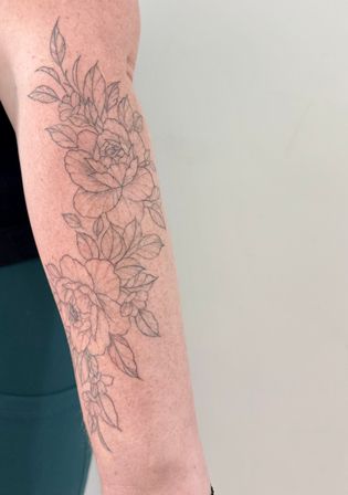 Get Inked in Style: Fine-Line Tattoo Session image 5