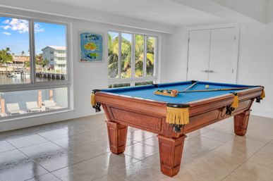 Lago Key 9-BR Canal Front Villa for Groups: Pool, Dock & Outdoor Lounge Areas image 2