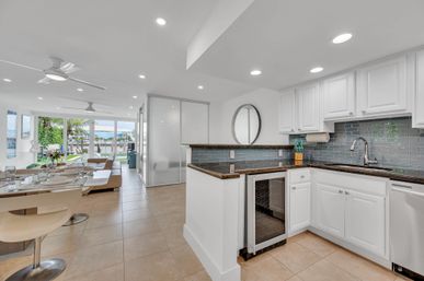 Lago Key 9-BR Canal Front Villa for Groups: Pool, Dock & Outdoor Lounge Areas image 49