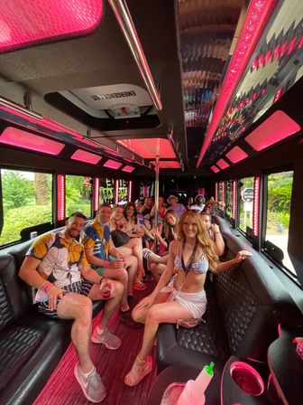 Day or Night Club Tour: Luxe Party Bus with Club Pickup Service, VIP Host, & Unlimited Drinks image 1