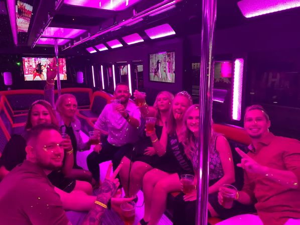 Day or Night Club Tour: Luxe Party Bus with Club Pickup Service, VIP Host, & Unlimited Drinks image 12