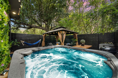 The Black House: Downtown Escape with Hot Tub, Chef, Stylish Decor, Massage & Mixology Class image 37