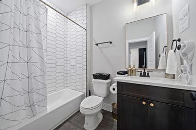 The Black House: Downtown Escape with Hot Tub, Chef, Stylish Decor, Massage & Mixology Class image 35