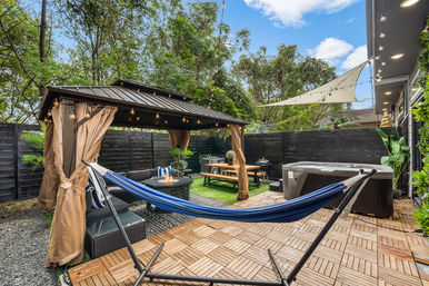The Black House: Downtown Escape with Hot Tub, Chef, Stylish Decor, Massage & Mixology Class image 40