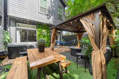 The Black House: Downtown Escape with Hot Tub, Chef, Stylish Decor, Massage & Mixology Class image 38