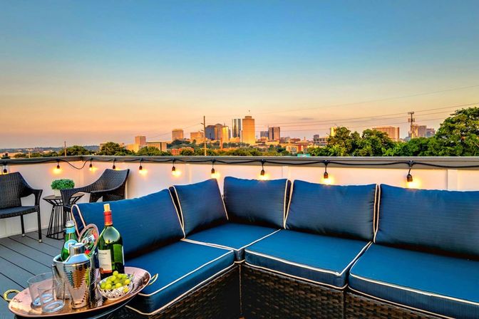 Urban Cowboy Getaway: 3BR Stay with Fire Pit, Rooftop Terrace & City Views image 1