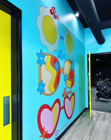 High-Energy Spin Class in an Insta-Worthy 70s Inspired Boutique Indoor Cycling Studio image 6