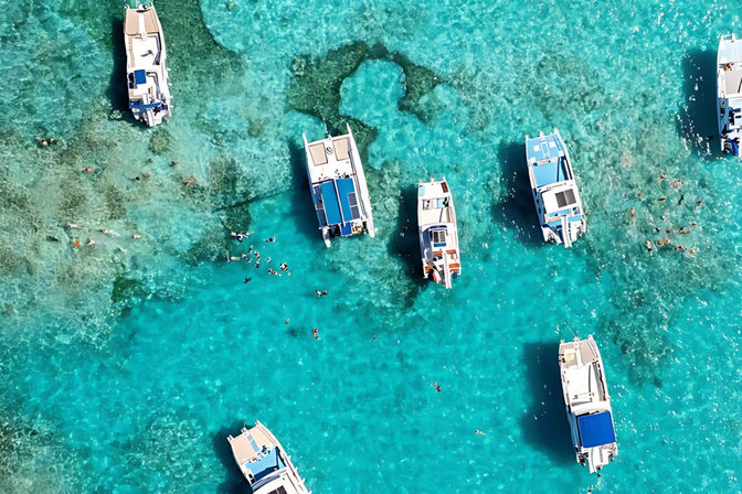 Join the Catamaran Party: Snorkeling, Open Bar, Music & Pickup Included image 10