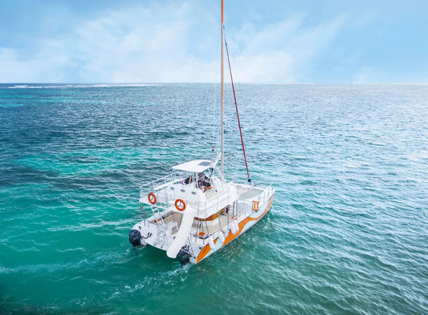 Punta Cana Catamaran Cruise: Snorkeling, Water Slide, Paddle Boards, Open Bar + Snacks image 2
