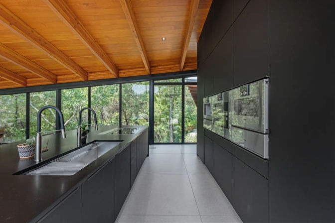Wander Austin Falling Leaves: Luxury Glass-House Retreat with Courtyard Fire Pit & Outdoor Pool image 17