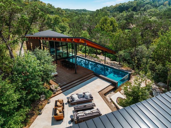 Wander Austin Falling Leaves: Luxury Glass-House Retreat with Courtyard Fire Pit & Outdoor Pool image 1