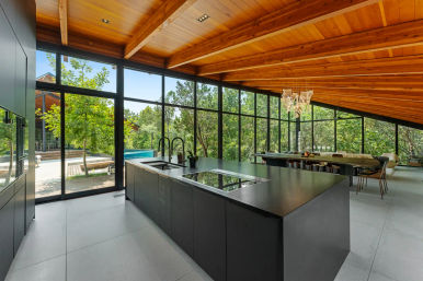 Wander Austin Falling Leaves: Luxury Glass-House Retreat with Courtyard Fire Pit & Outdoor Pool image 16