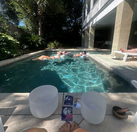 Floating Sound Bath Experience: Relax in a Pool with Soothing Sound Bowl Serenity image
