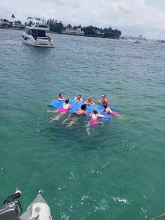 Peanut Island Yacht Day on a Vintage Hatteras (Captain & Crew Included) image 3