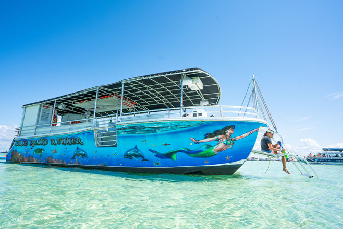 Crab Island Getaway: Public & Private Boat Tours for Swimming, Chilling & Partying image 4