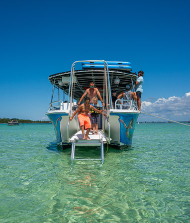 Crab Island Getaway: Public & Private Boat Tours for Swimming, Chilling & Partying image 5