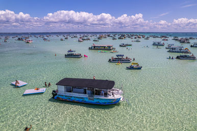 Crab Island Getaway: Public & Private Boat Tours for Swimming, Chilling & Partying image 2