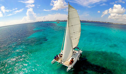 Isla Mujeres Catamaran Sailing Tour: Open Bar, Snorkeling, Beach Club + Lunch image 2