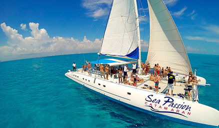 Isla Mujeres Catamaran Sailing Tour: Open Bar, Snorkeling, Beach Club + Lunch image 4