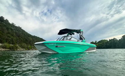 Wakeboarding at Lake Austin on a Nautique G23 (Up to 9 People) image