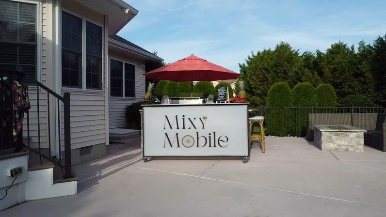 For the Bride Who’s Always Thirsty: Hot Bartenders & Custom Cocktails at Your Jersey Shore Rental image 3