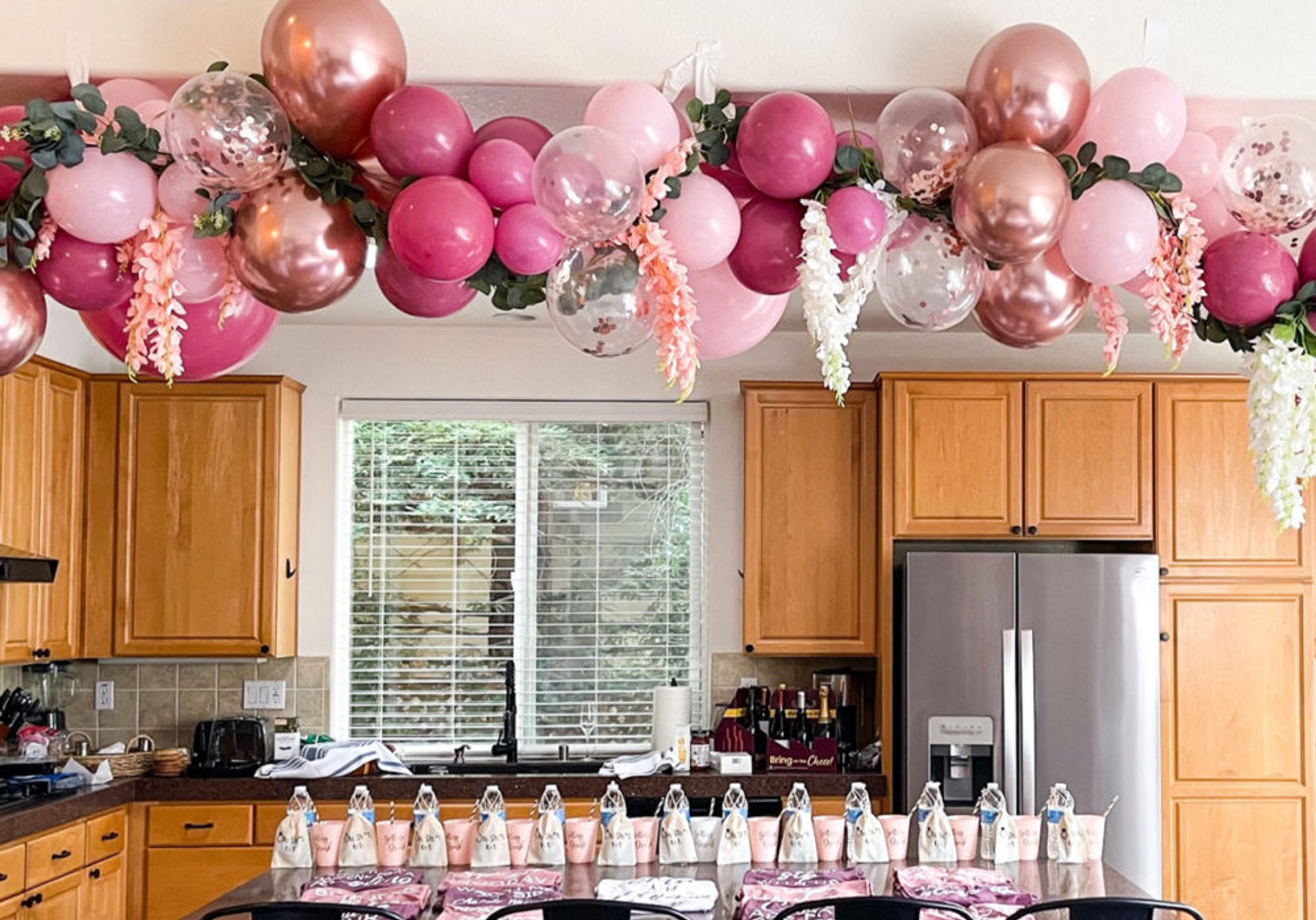 Insta-Worthy Pre-Arrival Party Decorations with Fill-the-Fridge, Gift Bags,  Mimosa Bar, Luggage Service and more