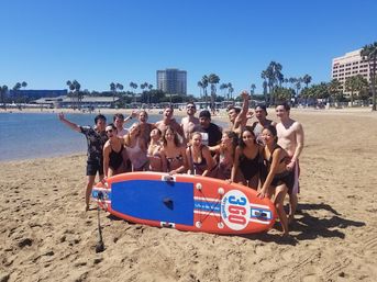 Epic Paddle Party: Stand-Up Paddleboarding & Beach Games in SoCal! image