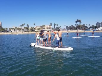 Epic Paddle Party: Stand-Up Paddleboarding & Beach Games in SoCal! image 12