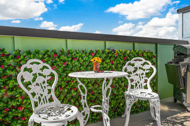 Bloom Haus: Luxe Oasis with Rooftop Lounge image 43