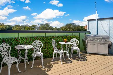 Bloom Haus: Luxe Oasis with Rooftop Lounge image 42