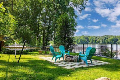 Rivers Edge: Scenic Waterfront Retreat with Private Dock + Fire Pit image 3
