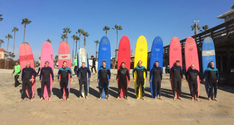 Surfing or Paddle Boarding Lessons at Laguna Beach: Reefs, Hidden Beaches, Dolphins, Marine Life, and More image 2