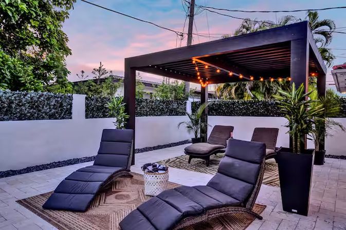 Paradise Palm Villa - Large Miami Getaway Home: Modern Villa with Pool & Entertainment Space image 38