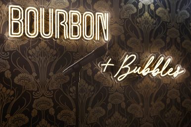 Bourbon and Bubbles: Retro Speakeasy-Style Home with Rooftop Hot Tub image 47
