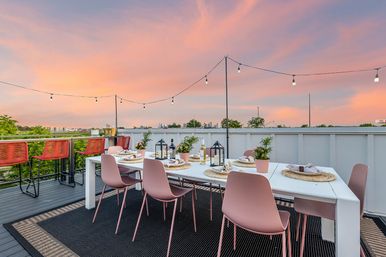 Bourbon and Bubbles: Retro Speakeasy-Style Home with Rooftop Hot Tub image 35