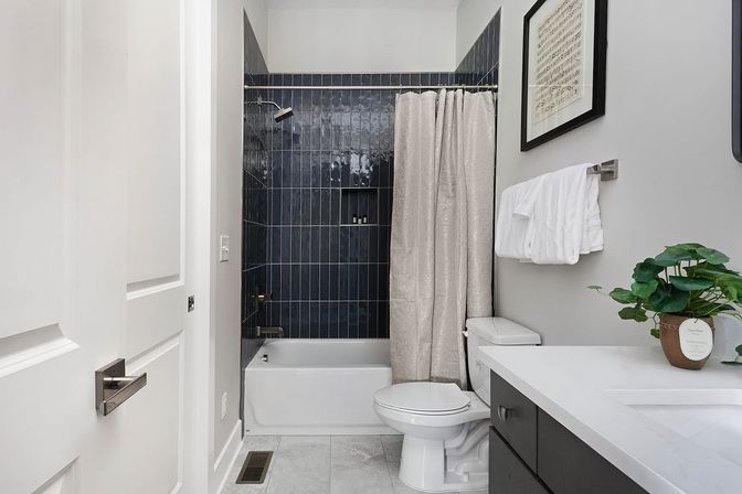 Bourbon and Bubbles: Retro Speakeasy-Style Home with Rooftop Hot Tub image 15