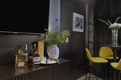 Bourbon and Bubbles: Retro Speakeasy-Style Home with Rooftop Hot Tub image 25