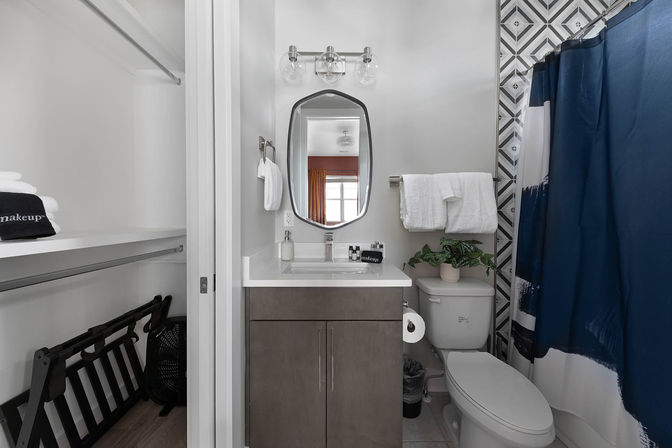 Bourbon and Bubbles: Retro Speakeasy-Style Home with Rooftop Hot Tub image 29