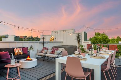 Bourbon and Bubbles: Retro Speakeasy-Style Home with Rooftop Hot Tub image 1