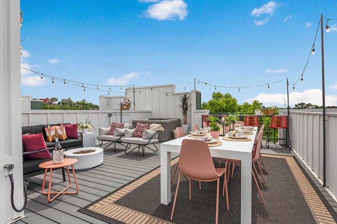 Bourbon and Bubbles: Retro Speakeasy-Style Home with Rooftop Hot Tub image 4