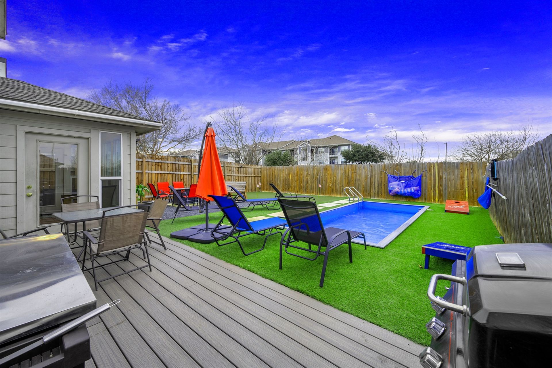 Backyard Bliss ATX Retreat: Pool, Arcade, Poker, Putting Green + Fire Pit image 2