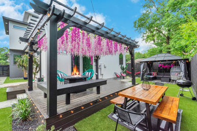 Bloom House HTX: Floral-Themed Downtown Home with Hot Tub, Chef, Massage & Mixology Class image 1