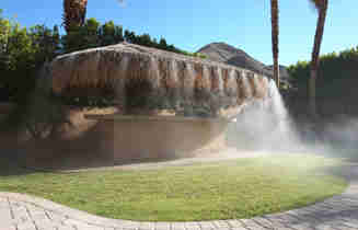 Residential misting system installed in a patio of a backyard
