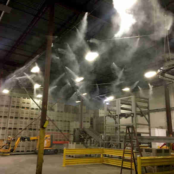 Misting system in a storage unit