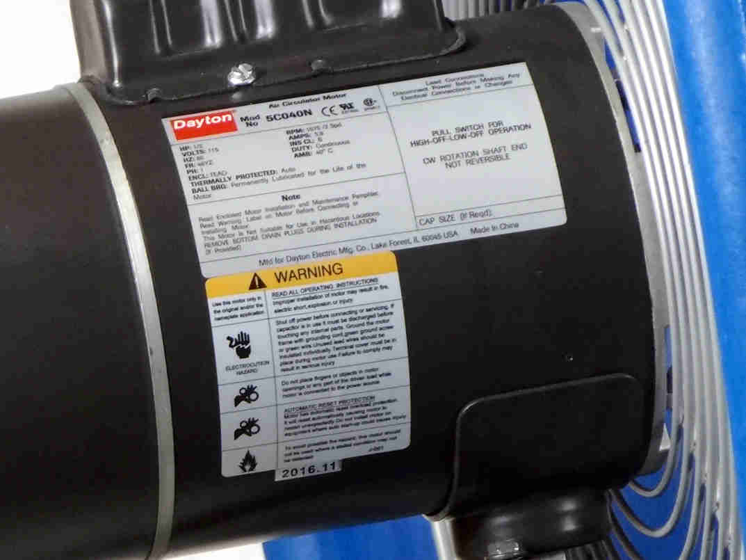 Warning label of he "BOSS" 24 Inch Outdoor/Indoor Industrial Wall Mounted 2 -Speed Oscillating Shrouded Fan