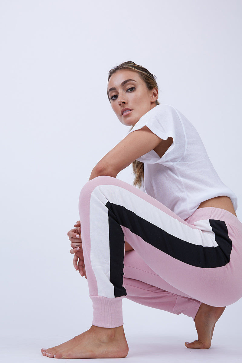 black joggers with pink stripe