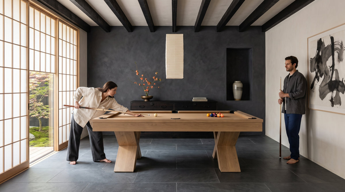 A pale oak pool table in a room with shoji screens and a dark plaster wall